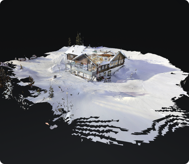 A Matterport dollhouse view of a large snowy mountain cabin